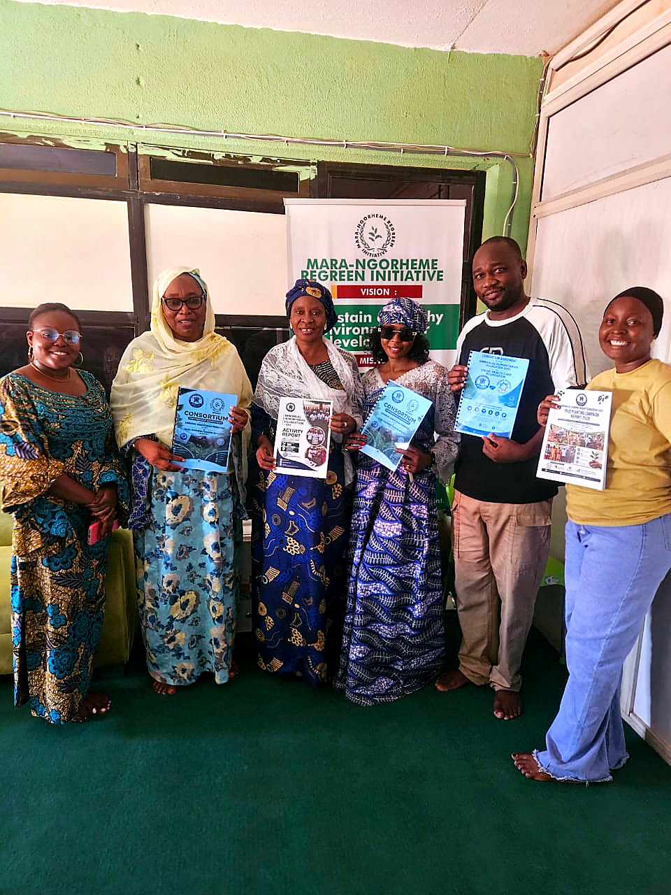 EHF, MANGRI and UHCF representatives with signed consortium documents at the Mara-Ngorheme Regreen Initiative office