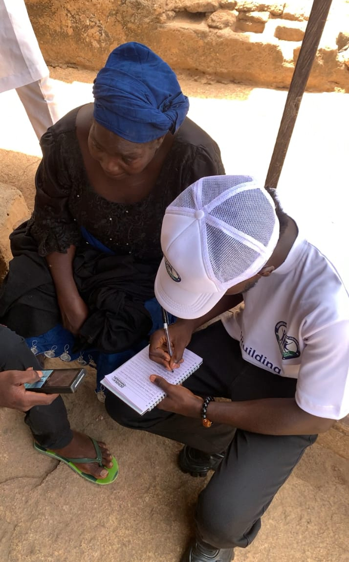 EHF documenting community experiences during a peacebuilding visit in Anguwan Rukuba, Plateau State